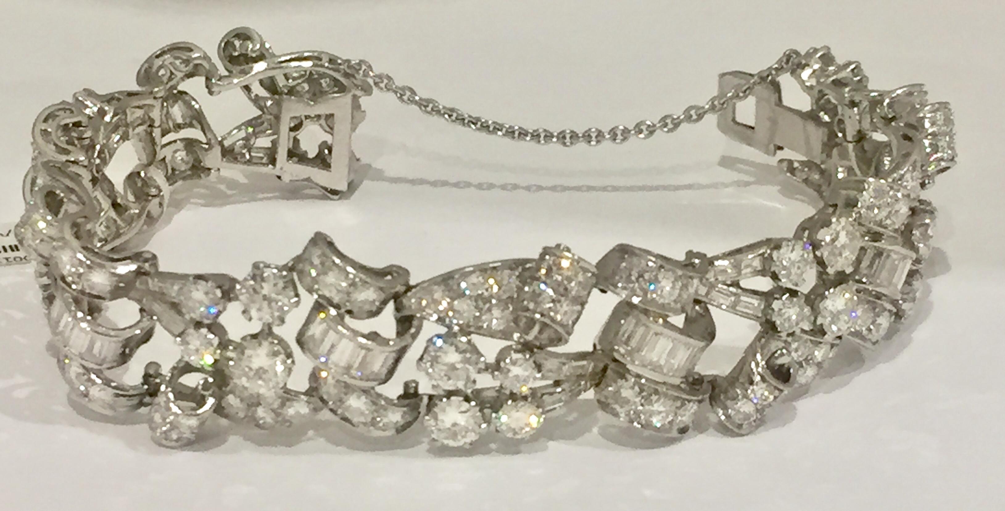 Very elegant and smooth Vintage Diamond Bracelet in Platinum. Set with 32 larger and 120 smaller brilliant cut diamonds and 72 baguette diamonds of a ca. 24 ct,  Wesselton, vs. 