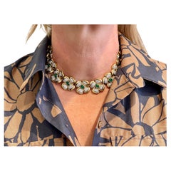Collana vintage floreale con smeraldi e diamanti