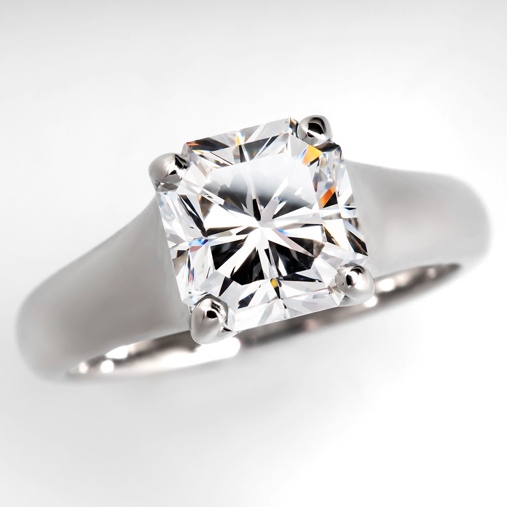 This gorgeous authentic Tiffany & Co. Lucida engagement ring is centered with a spectacular 2.56 carat Lucida diamond grading E / VVS1. The ring is in excellent condition, and freshly polished like new. The diamond is laser inscribed 
