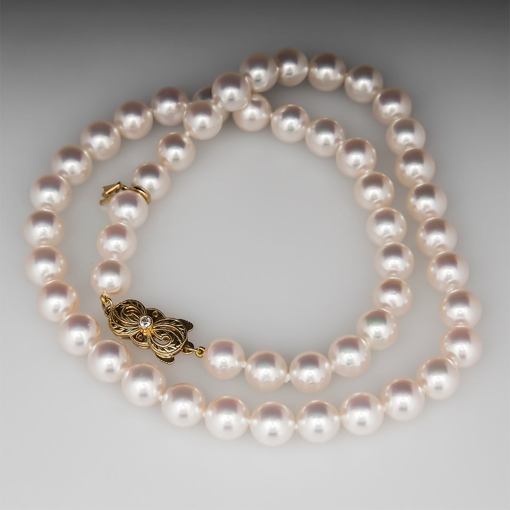 This magnificent Mikimoto pearl necklace features some of the finest Akoya pearls available. The pearls grade AA and are silver/pink in color, as stated in the Mikimoto certificate. The clasp is crafted of solid 18k yellow gold and is set with a