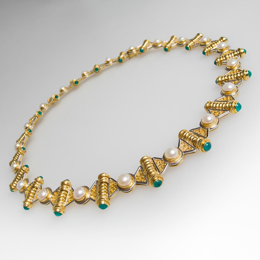 An amazing piece of designer fine jewelry from Alix and Company. The necklace features 12 pearls and 40 paraiba tourmalines set into 18k, 22k gold and platinum. Please contact us for more detailed info and a video.