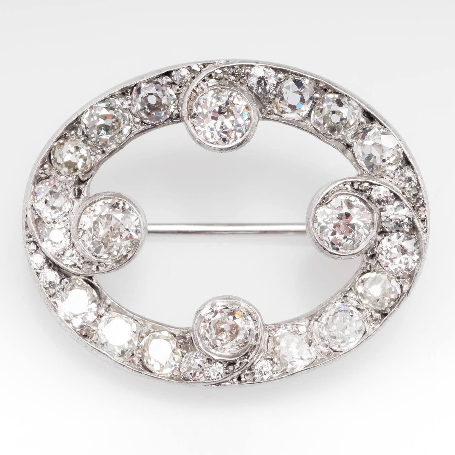This stunning antique brooch pin contains 8.5 carats of natural diamonds. It features a mixture of 4 different antique cut diamonds including rose cut, French cut, Old European cut, and Old Mine cut. All the stones have been set into silver which