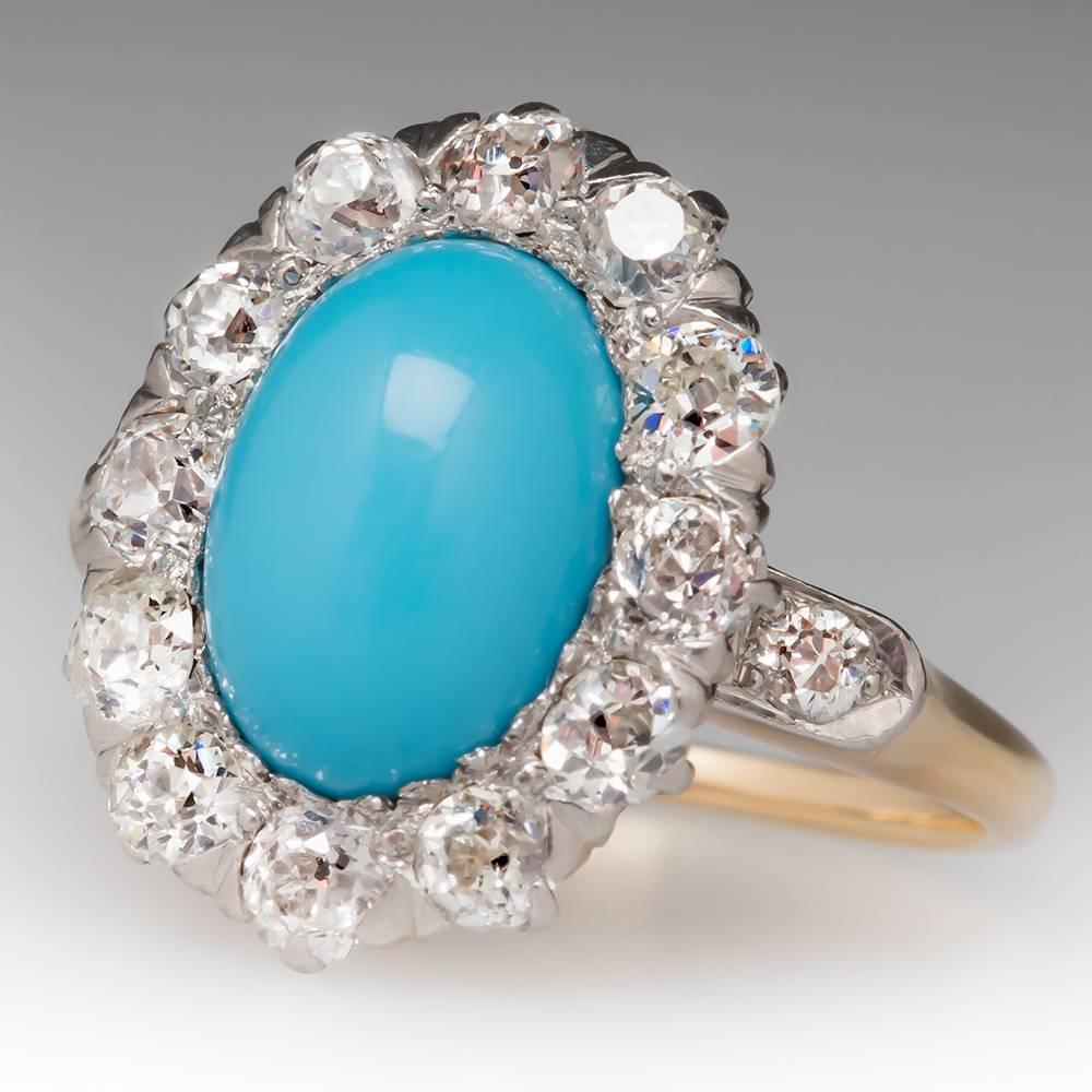 This gorgeous ring dates from the late Victorian era and features the most stunning natural turquoise center stone surrounded by a lovely old Euro and swiss cut diamond halo. The ring has a nice low profile design and is unique and beautiful. It is