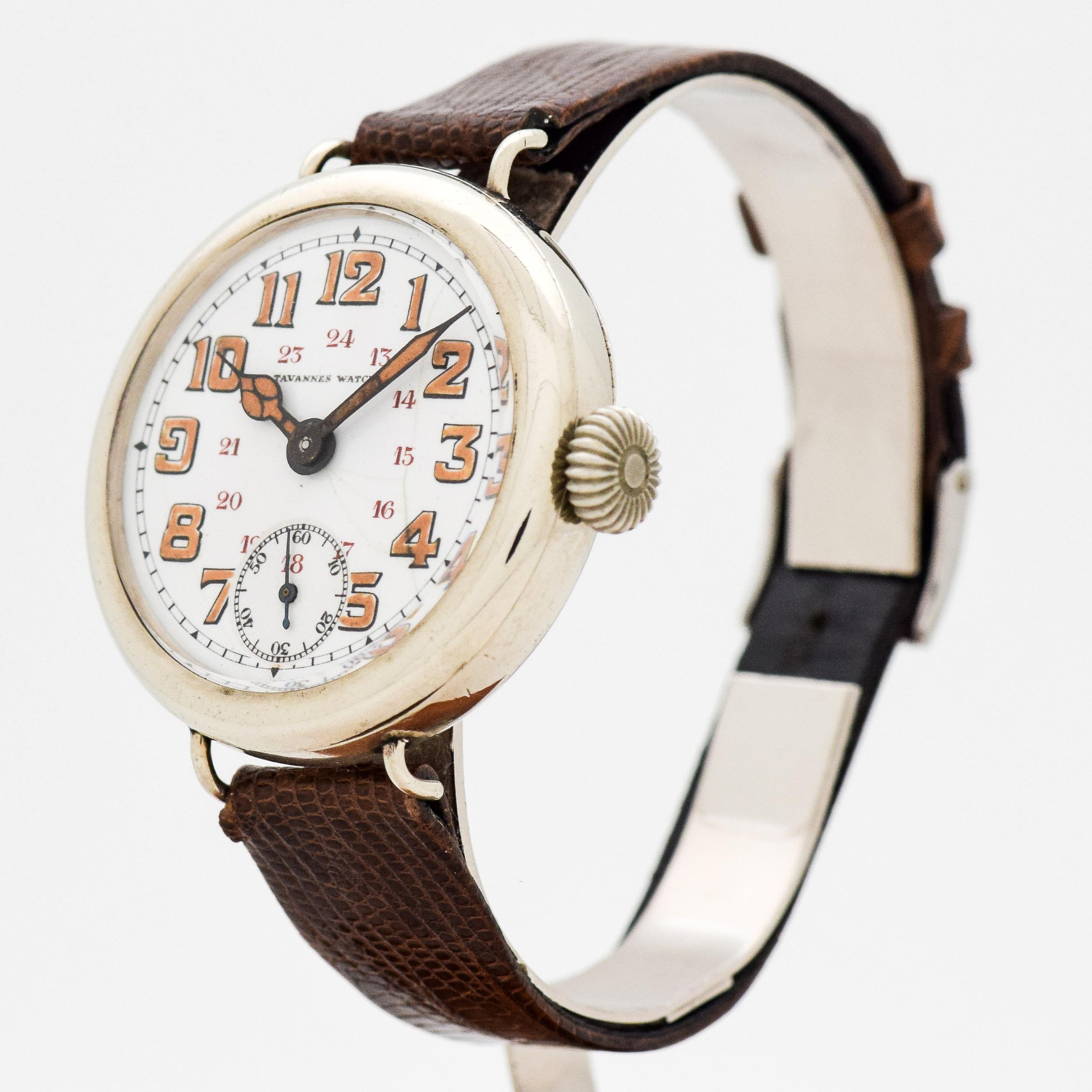 1910's Vintage Tavannes WWI Military Era Over Sized 37 mm Wide Chrome watch with Original White Enamel Dial with Brown Luminous Arabic Numbers. 37mm x 41mm lug to lug (1.46 in. x 1.61 in.). 11 jewel, manual-wind movement.