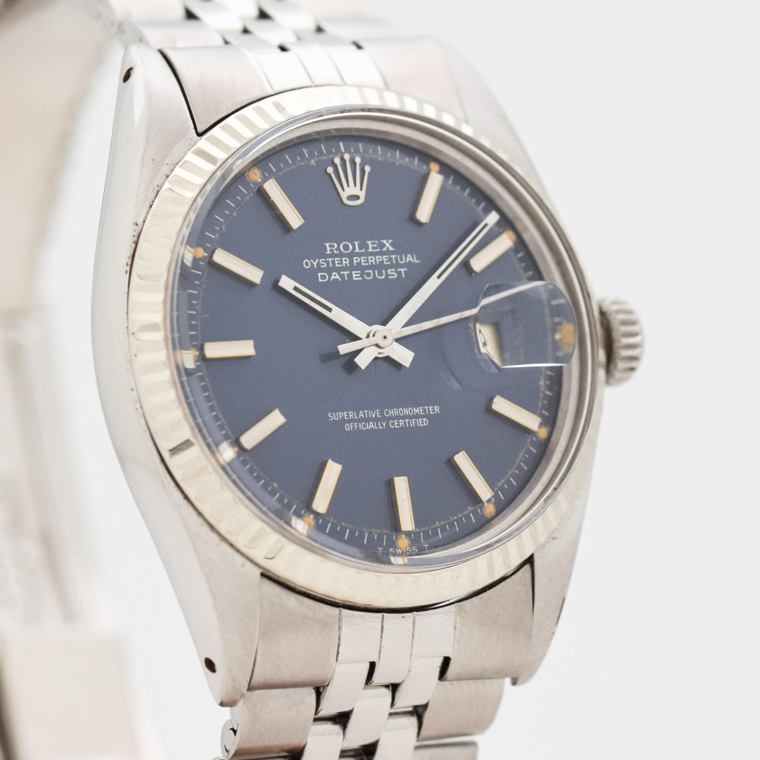 1971 Vintage Rolex Datejust Ref. 1601 14k White Gold Fluted Bezel with Stainless Steel Case watch with Rare Original Blue Dial with Applied Steel Stick/Bar/Baton Markers with Original Rolex Stainless Steel Jubilee Bracelet. 36mm x 43mm lug to lug
