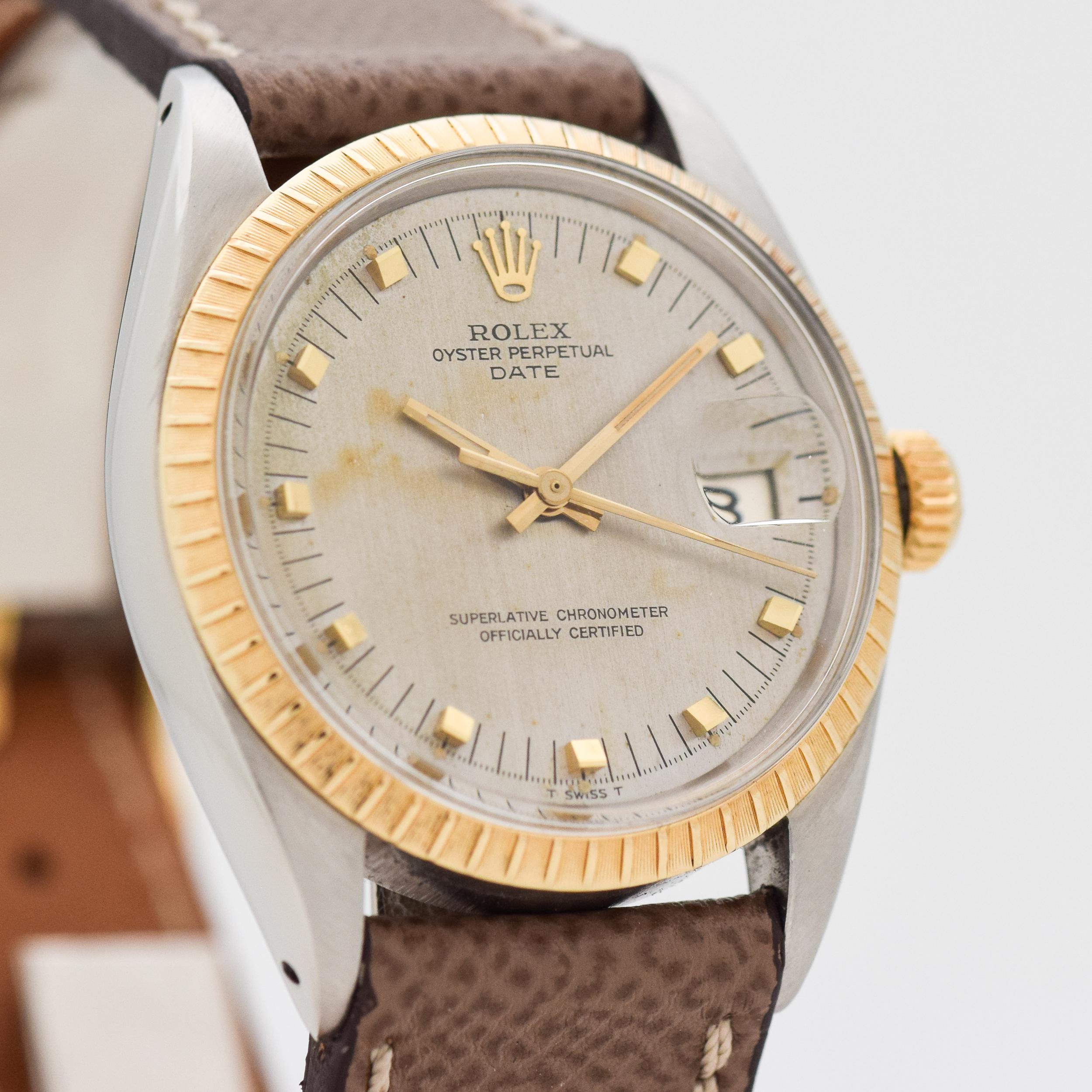 1968 Vintage Rolex Date Automatic Ref. 1505 Two Tone 14k Yellow Gold Fluted Bezel and Stainless Steel watch with Original Unusual Silver Dial with Applied Gold Color Unique Square Markers. 35mm x 41mm lug to lug (1.38 in. x 1.61 in.) 26 jewels,
