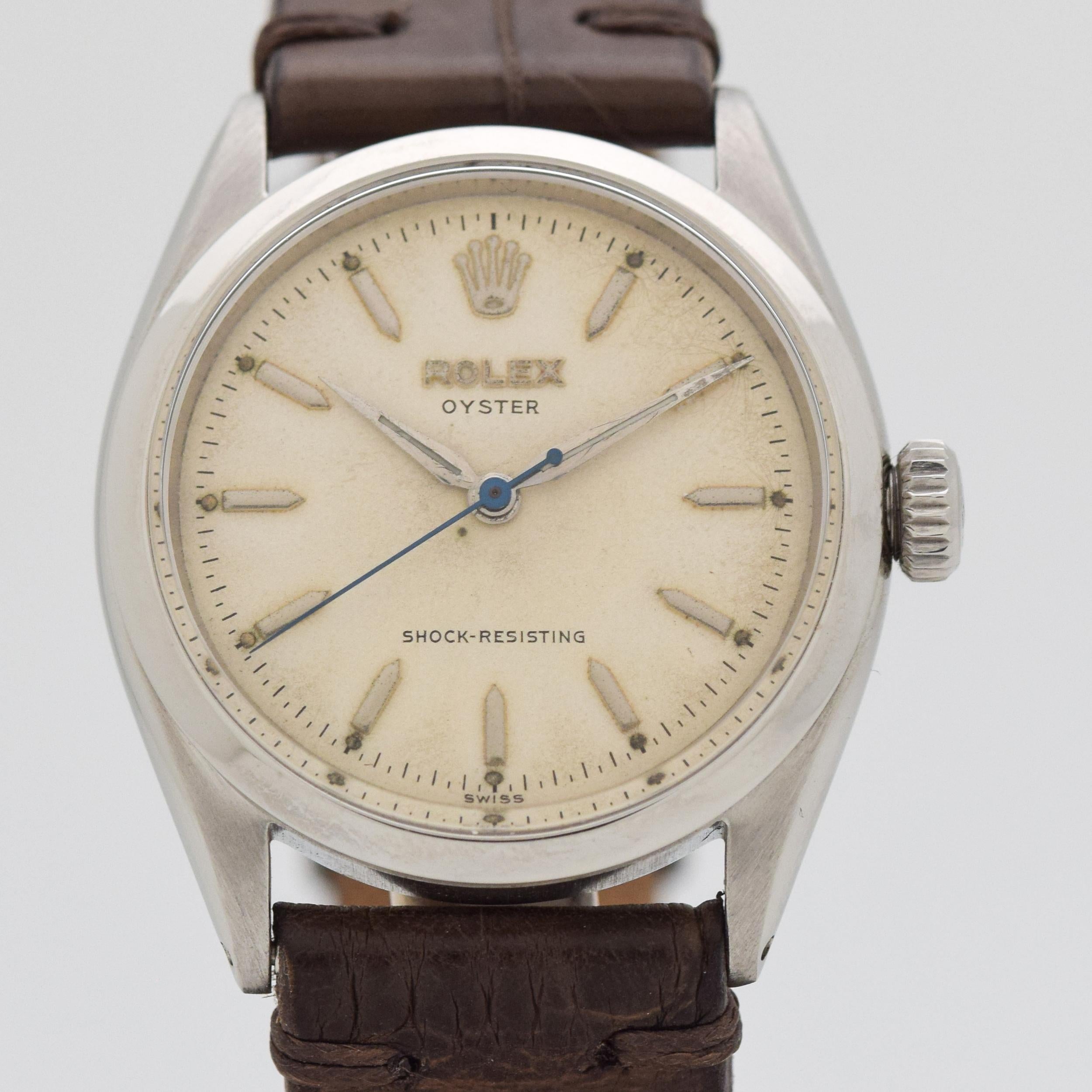 1955 Vintage Rolex Oyster Ref. 6480 Stainless Steel watch with Original Silver Dial with Applied Pointed Bar/Baton Markers. 34mm x 38mm lug to lug (1.34 in. x 1.5 in.) 17 jewel, manual caliber 1210 movement. Triple Signed.
