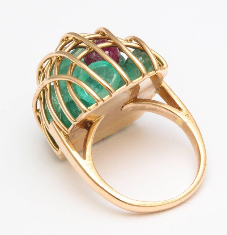Modern Gold Caged Gemstone Ring with Emeralds and Rubies