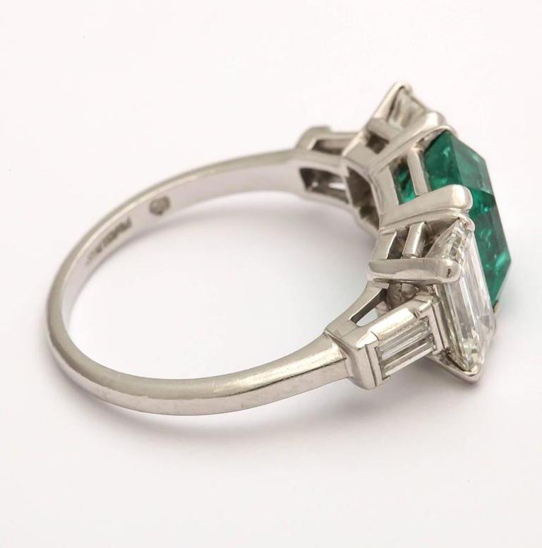 Women's Art Deco Emerald and Diamond 3-Stone Ring Set in Platinum