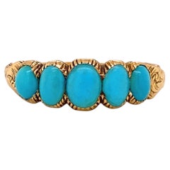 Bague ancienne ovale en turquoise et or 15 carats, ornée de cinq pierres et gravée à la main, vers les années 1860