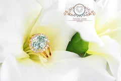 3.81 Carat Oval Cut Fancy Blueish Moissanite 18 Karat Golden Cocktail Ring