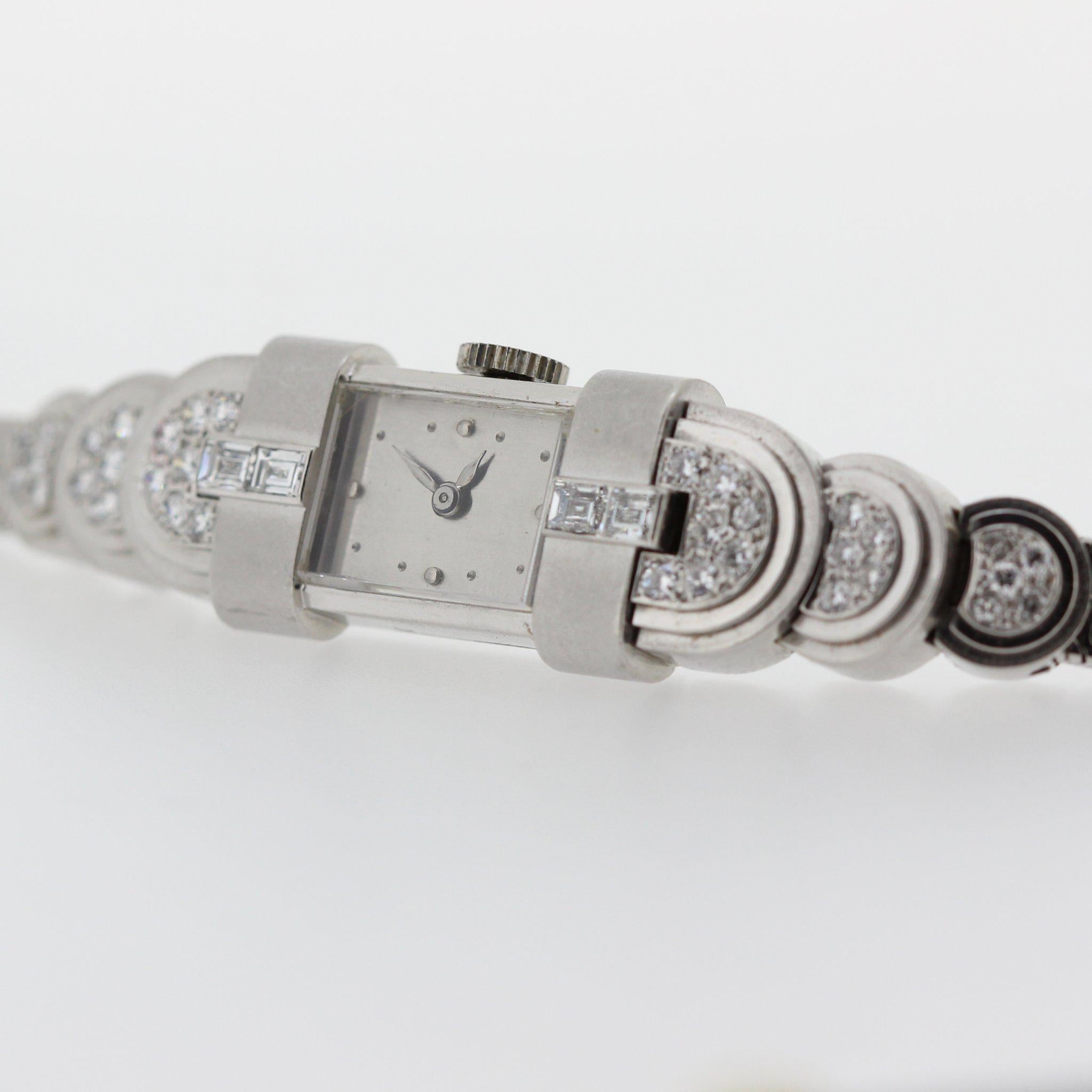 This Patek Philippe Art Deco Platinum and diamond ladies watch, circa 1949, features a baguette shaped case with 8