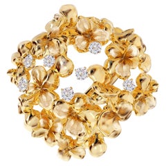 Bague contemporaine en or rose dix-huit carats avec sept diamants