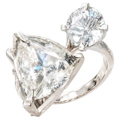 Engagement Ring in Eighteen Karat White Gold with White Paraiba Tourmaline