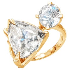 Engagement Ring in Eighteen Karat Rose Gold with White Paraiba Tourmaline