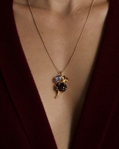 Eighteen Karat Yellow Gold Pendant Necklace with Dark Quartz and Blue Topaz