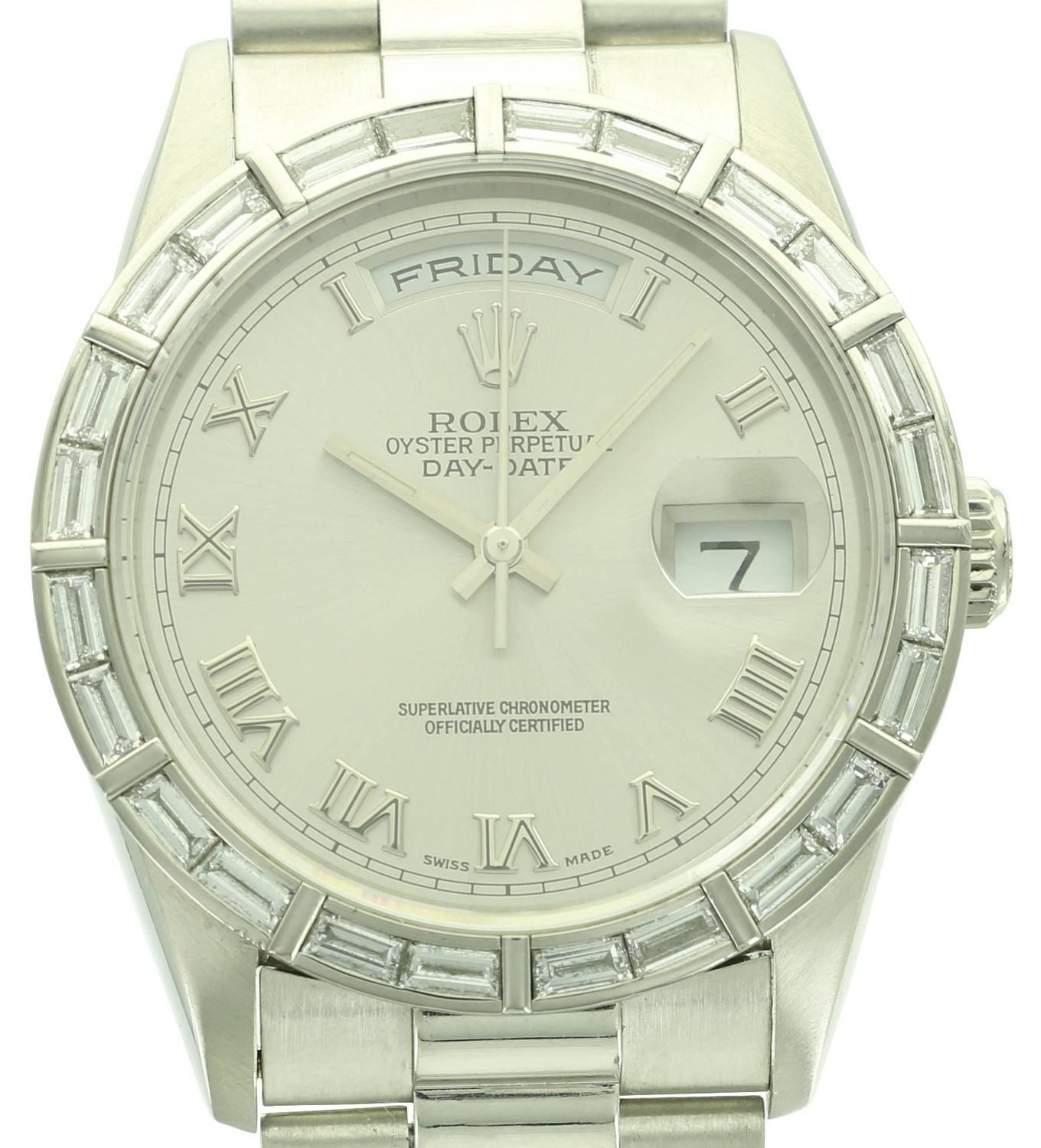 rolex day date platinum on wrist