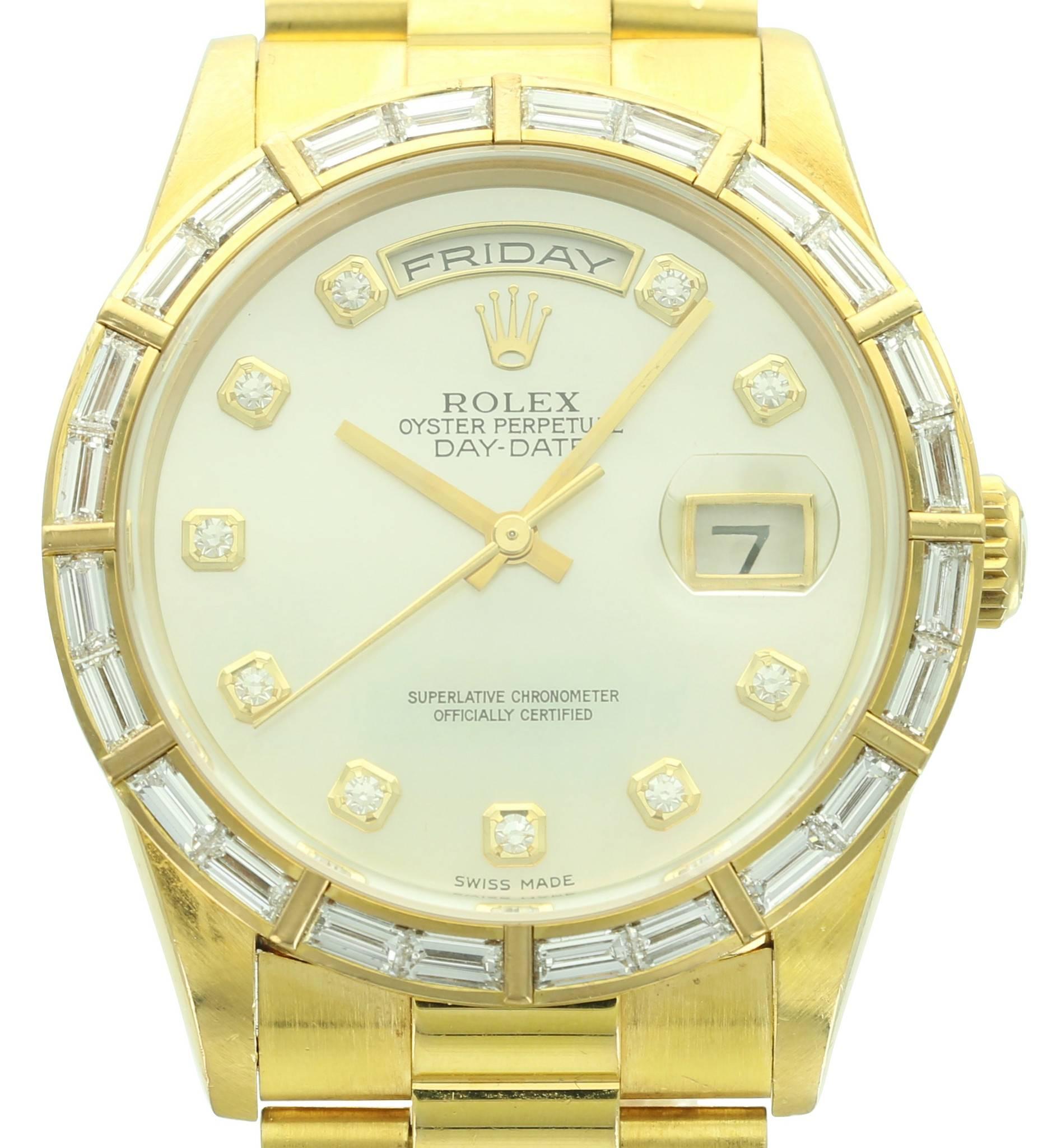 This Rolex Day-Date, ref. 18368 is fitted with a beautiful original Mother of Pearl dial, diamond markers and original 24 baguette diamonds in the bezel. It comes complete with its original papers and has a W363 serial number. 