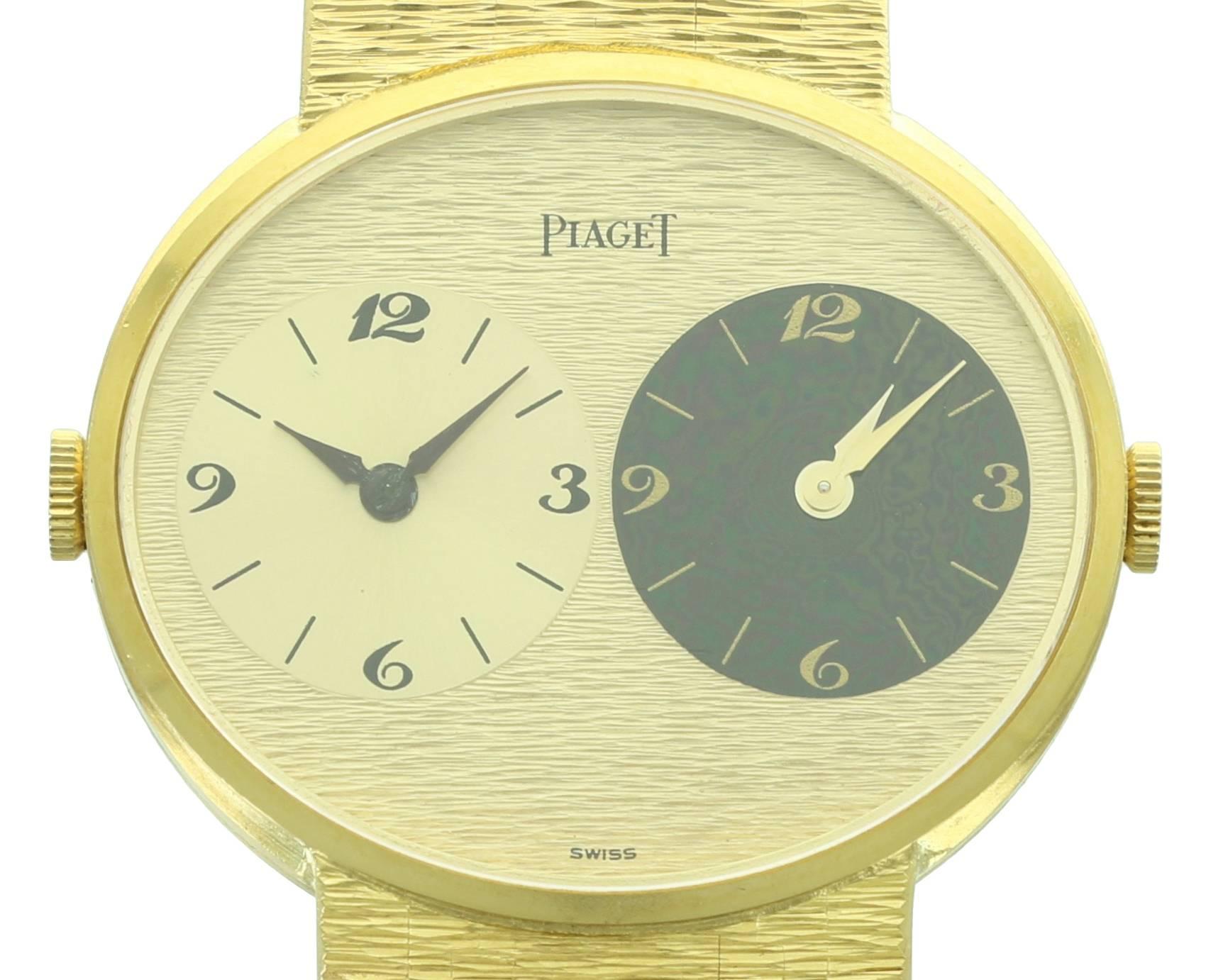 This thin, 1970s Piaget watch keeps time in two timezones while looking elegant and classic. It comes on its original Piaget bracelet, fitting a wrist 7 inches in circumference. 