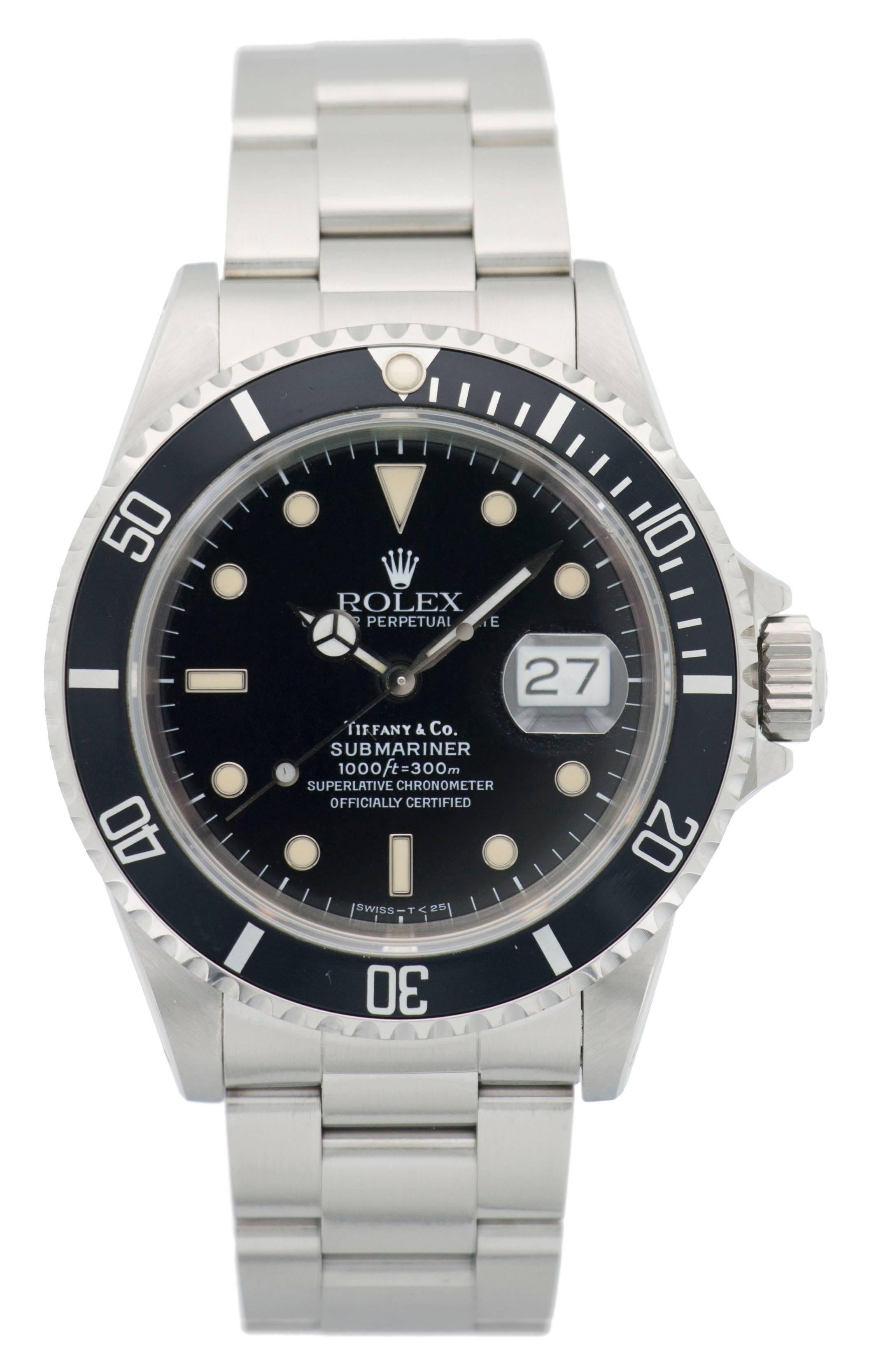 This Rolex Submariner, ref. 16610 was produced in 1991 and originally retailed by Tiffany & Co. The watch is in mint condition, with a fantastic case, slightly patinad markers and a mint condition dial. It comes with the original papers marked for