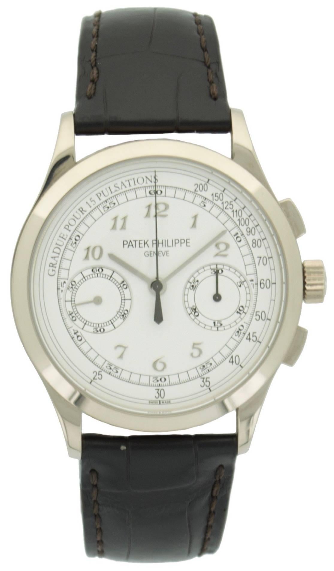 This well balanced, classically designed chronograph is one of Patek Philippe best modern pieces. The watch wears very well with a nice big case while not being too thick or overbearing. This example is in like-new condition with a beautiful white