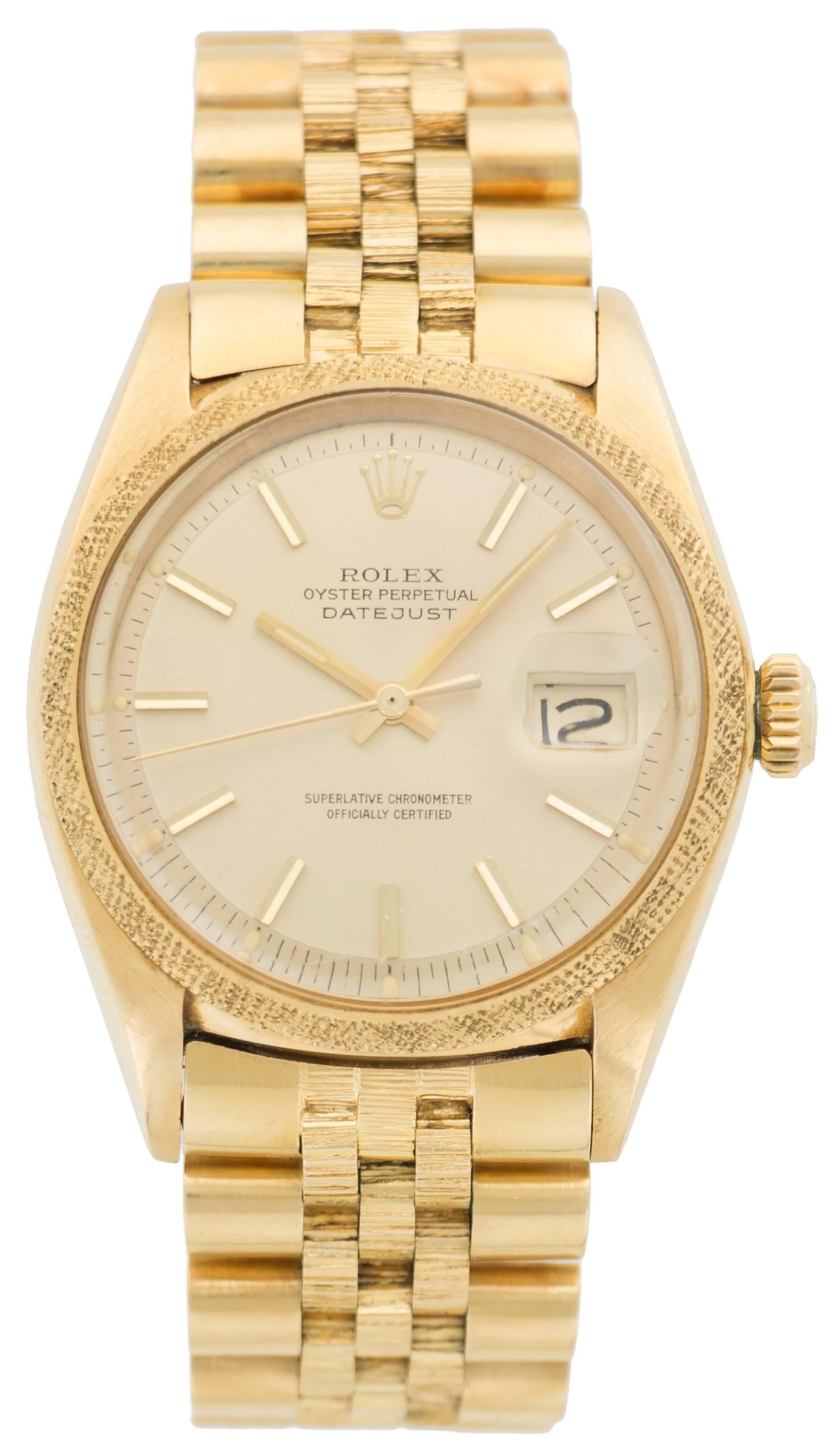 This yellow gold Rolex Datejust features a rare 