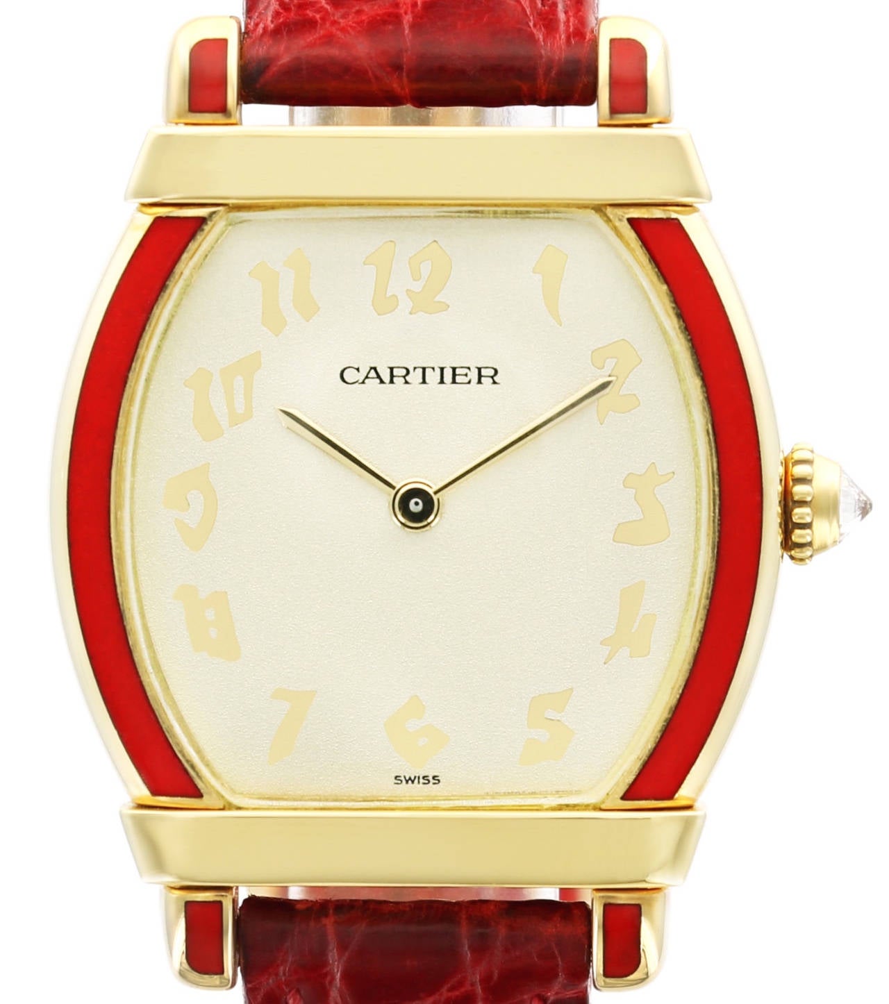 This rare and gorgeous Cartier Tortue watch features Chinese-style Arabic numerals, red enamel enhanced bezel, diamond-set crown and 18k yellow gold case. This is a very rare Cartier watch that is sure to impress.