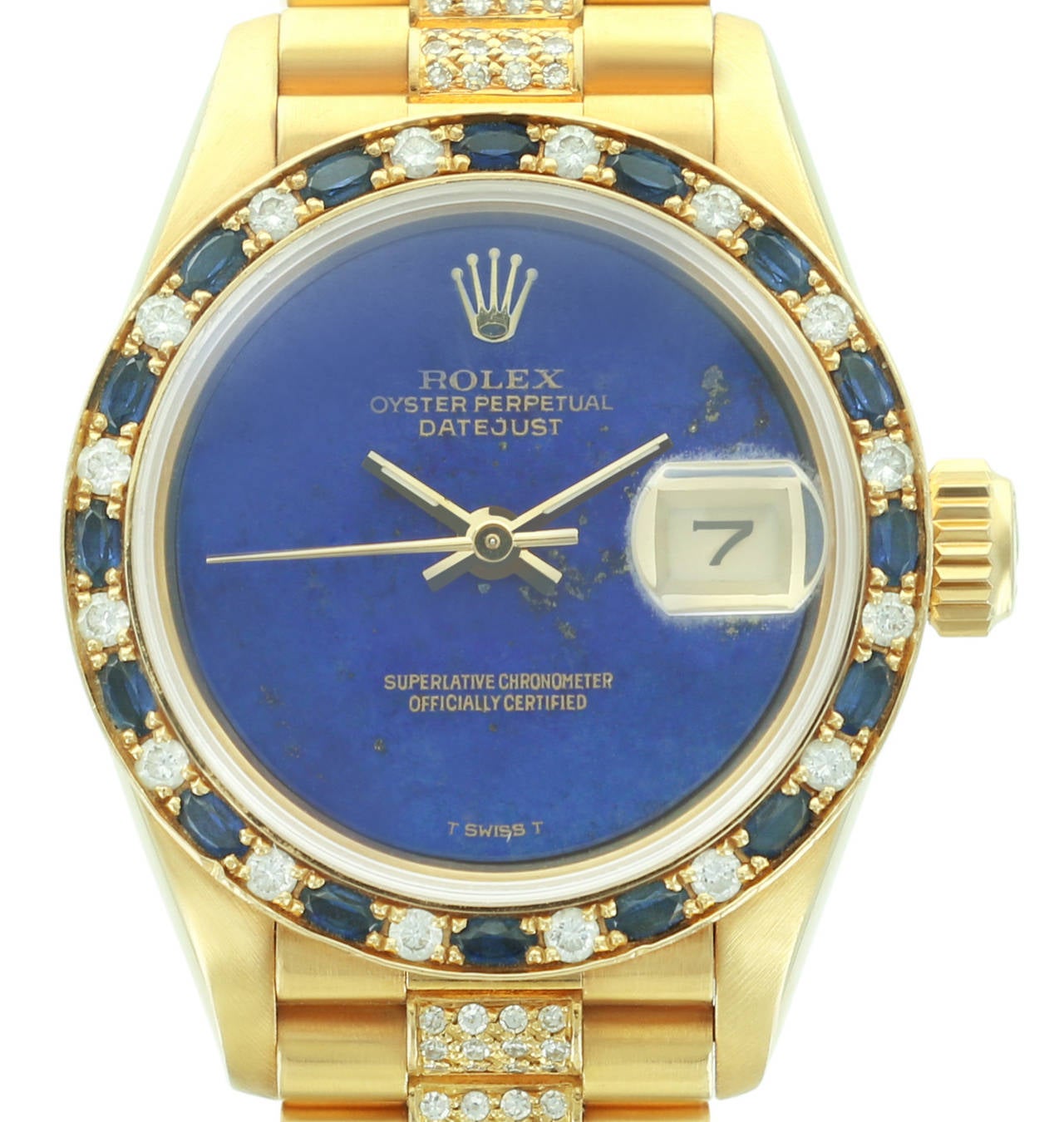 A beautiful step away from the every day Rolex ladies Datejust, this reference 69198 features a gorgeous lapis dial and a diamond and sapphire bezel. The bracelet is 18k yellow gold with diamond center links.