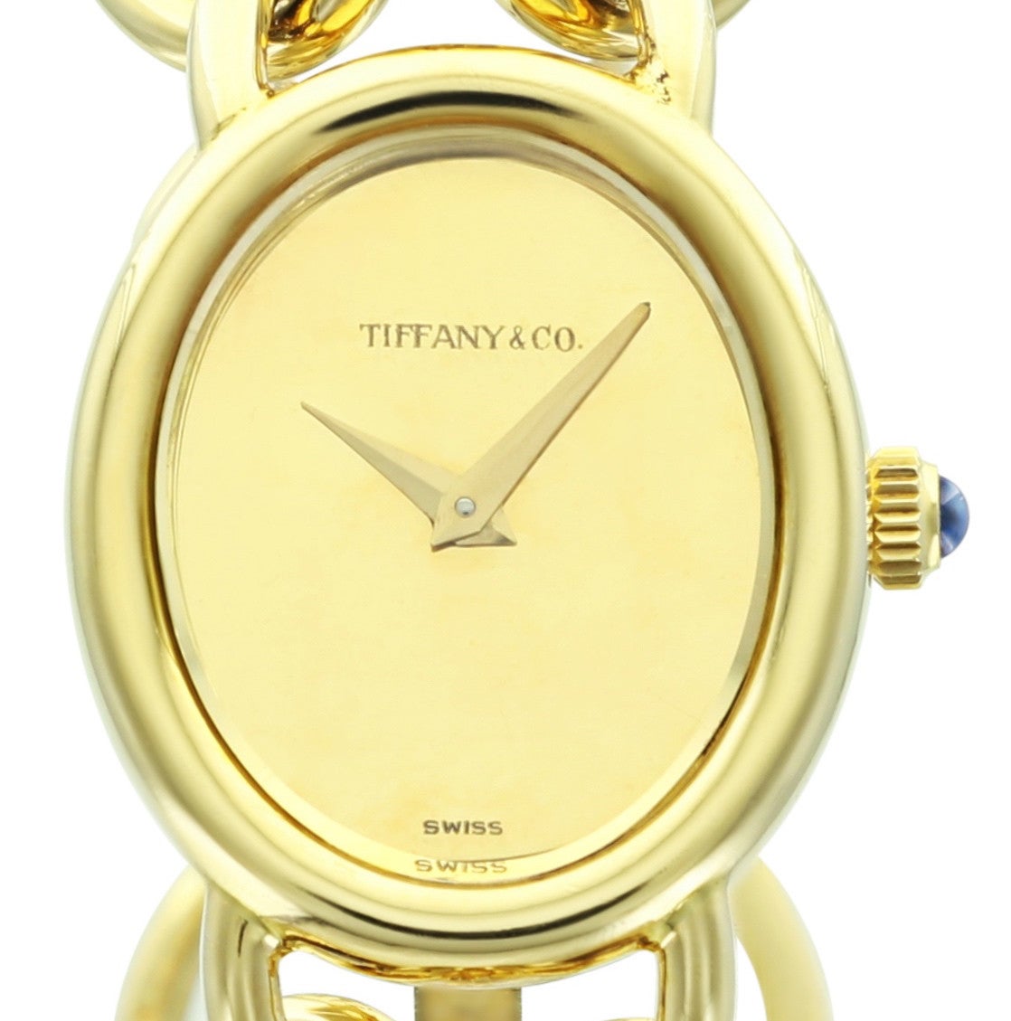 This yellow gold Tiffany & Co. ladies watch is a small, elegant piece with 18k gold linked bracelet and champagne dial stamped 