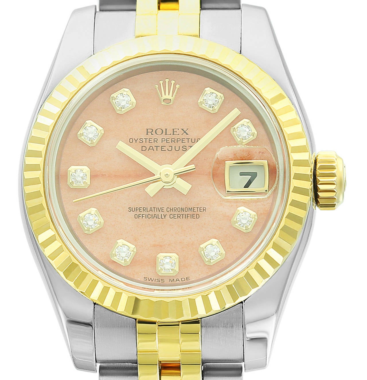 A great edition of a classic model, this two-tone ladies Rolex Datejust features an original coral dial with factory diamond markers. This subtle pop of color and rare dial make this lovely watch a showstopper. It is truly a piece to be worn and