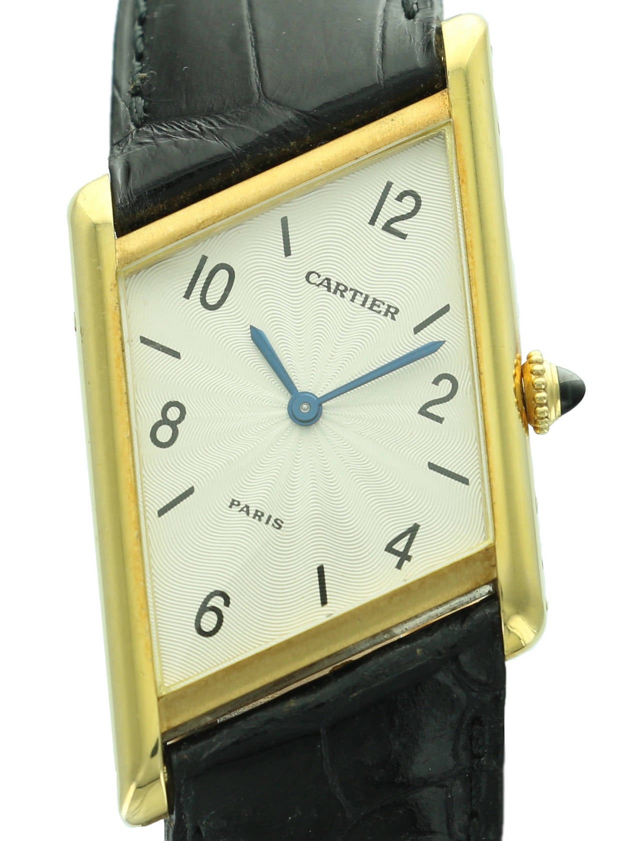Cartier only produced 300 of this rare and elegant watch. It is a nod to Cartier's classic Tank design, with a twist. In excellent condition, this beautiful, slim watch is both fun and sophisticated at the same time.