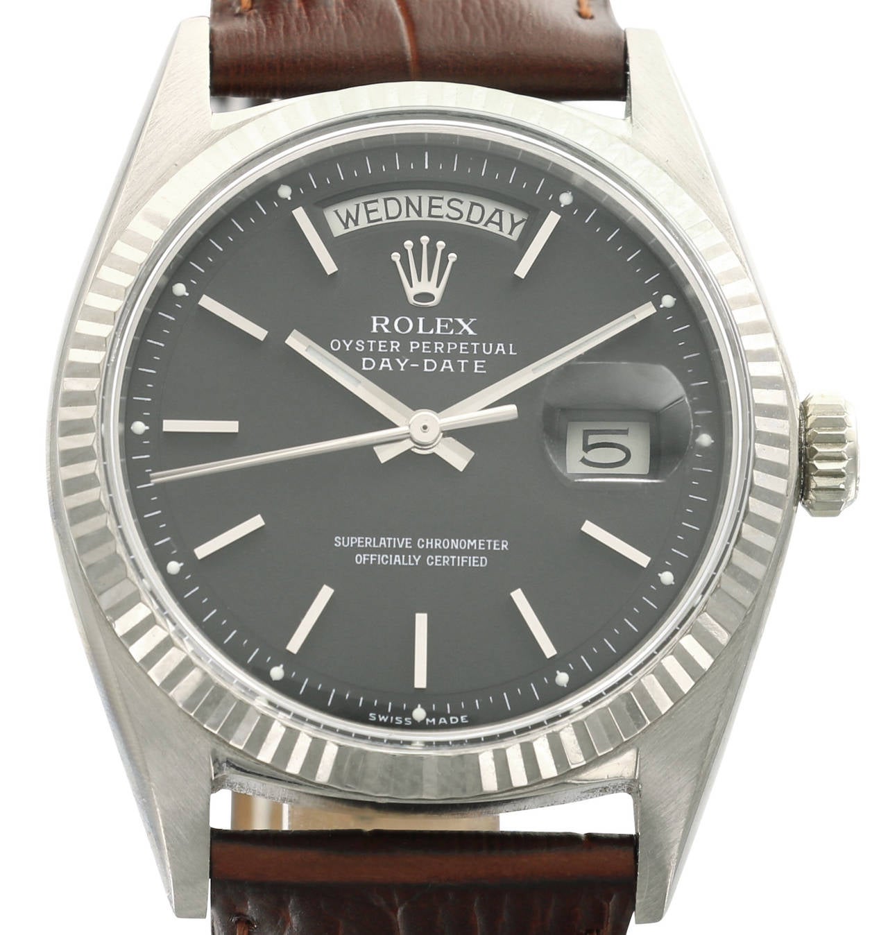 This white gold Rolex Day-Date features a beautiful black dial, high quality crocodile strap and original Rolex buckle. The serial number is 1,06X,XXX.