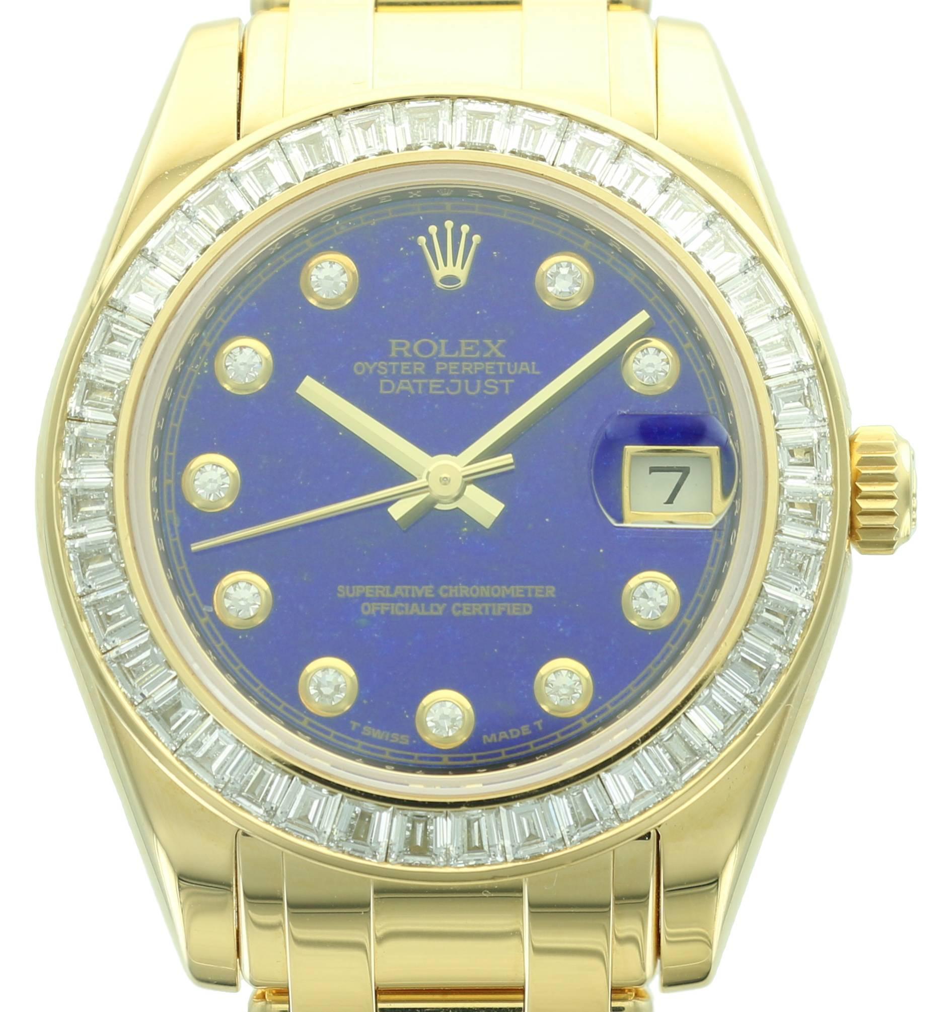 This rare, yellow gold, mid-sized Rolex Datejust Pearlmaster features a Lapis Lazuli dial, diamond markers and a diamond bezel. 