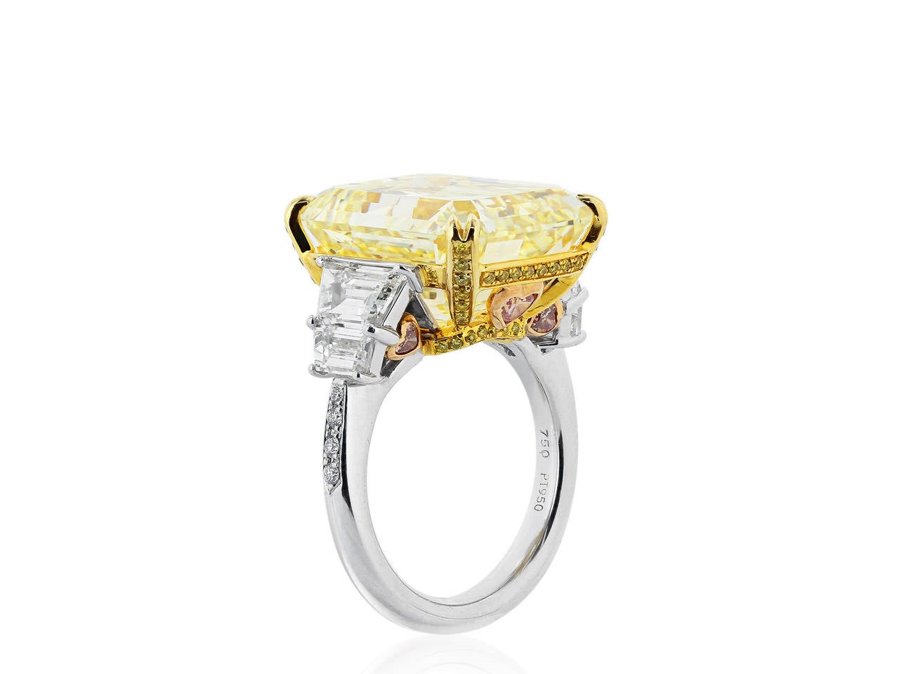 Tri tone platinum, 18 karat rose and yellow gold ring consisting of emerald cut natural canary diamond weighing 19.02 carats, measuring 17.52 x 13.59 x 9.01 mm, having a color and clarity of Fancy Yellow/VVS2 with GIA report 2165342391, flanked by 4