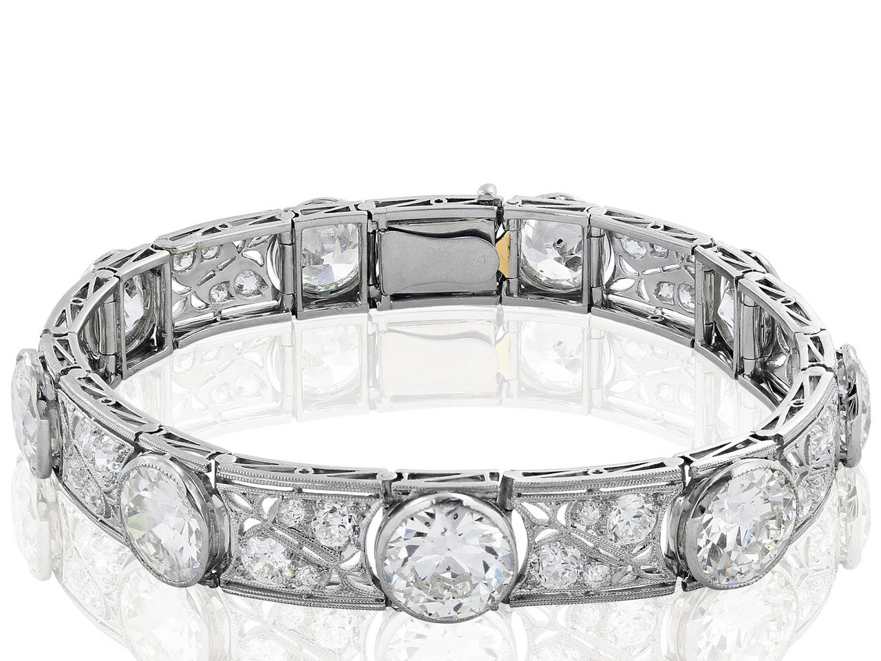 Platinum Edwardian bracelet consisting of 9 Old European cut diamonds with 36 diamonds set in open work design weighing 28.50 carats with a color and clarity of H/I SI1 respectively.