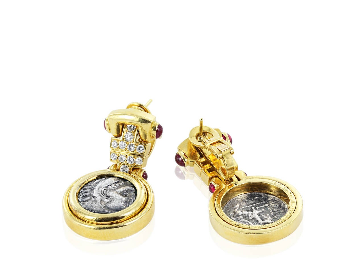 18 karat yellow gold ancient coin drop earrings set with full cut diamond and cab ruby accents, signed Bulgari