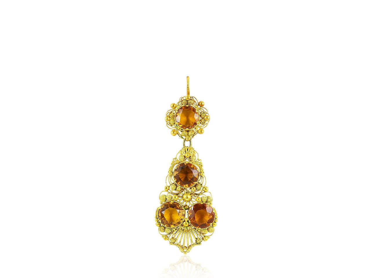 Antique Victorian 18 karat yellow gold, earring and pin/pendant suite designed in an ornate wire floral motif with granulation. The drop earrings consist of  8 old European cut citrine stones having an estimated total weight of 14.50 carats and the