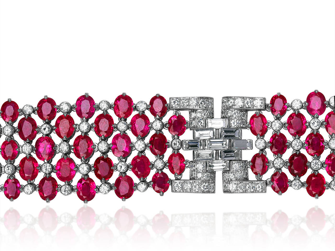 Stunning Burmese ruby and diamond bracelet set in platinum with over 40 carats of gem pigeon blood red rubies and 13.5 carats of gem white diamonds.