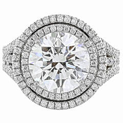 DeBeers GIA Certified 5.03 Carat I/SI1 Round Brilliant Cut Diamond Ring