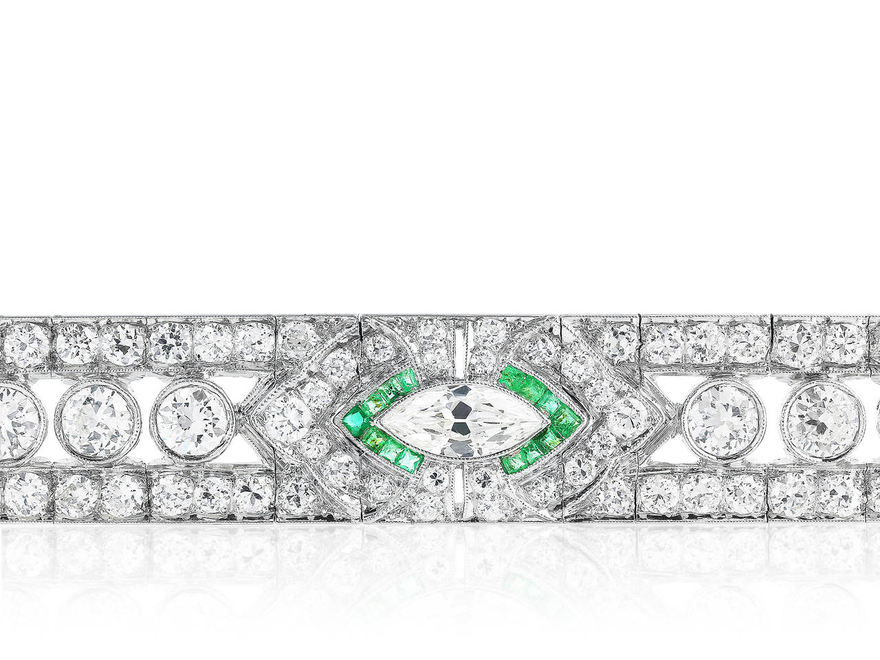Platinum marquise & OEC diamond (apx 15ctw) & calibre emerald flexible art deco bracelet.