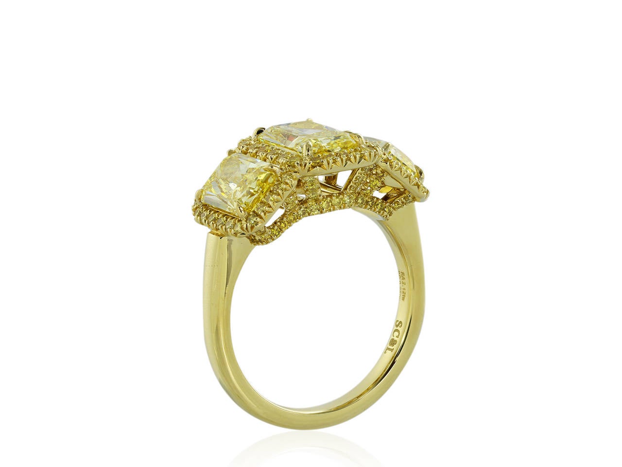 Custom made, 18 karat yellow gold three stone engagement ring consisting of one radiant cut canary diamond weighing 1.41 carats, measuring 8.16 x 5.80 x 3.55 mm, having a color of Natural Fancy Intense Yellow/SI1 with GIA report number 2145324663