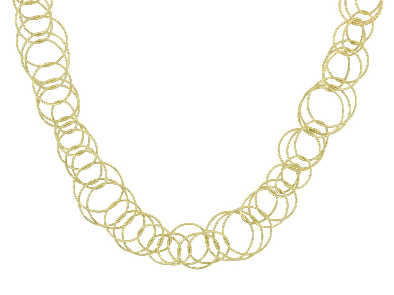 18 karat yellow gold 40 inch necklace consisting of various sized round links with a textured finish. Handmade in Italy and signed Buccellati, from the Hawaii Collection.