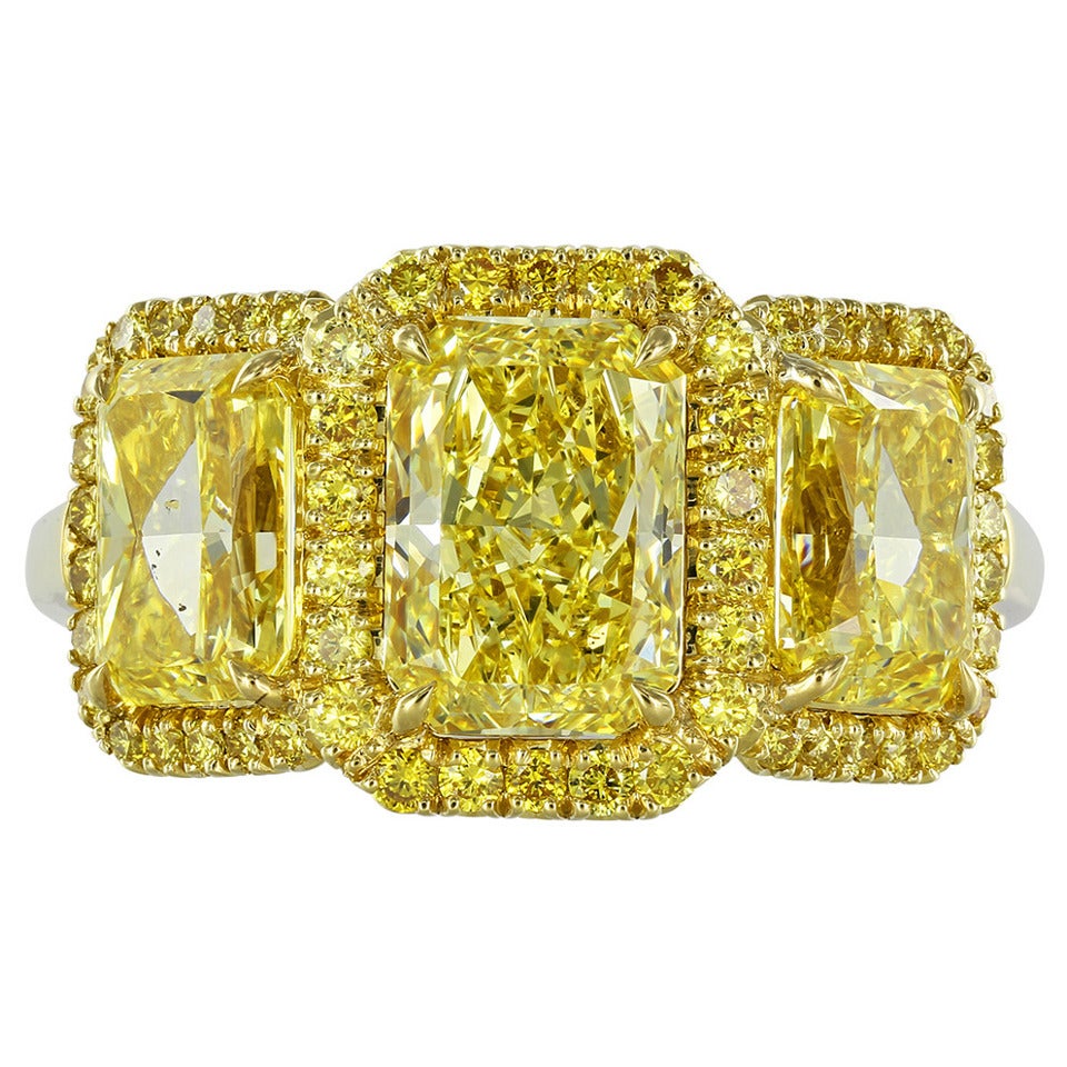 Fancy Intense GIA Certified Yellow Diamond Gold Three-Stone Engagement Ring For Sale