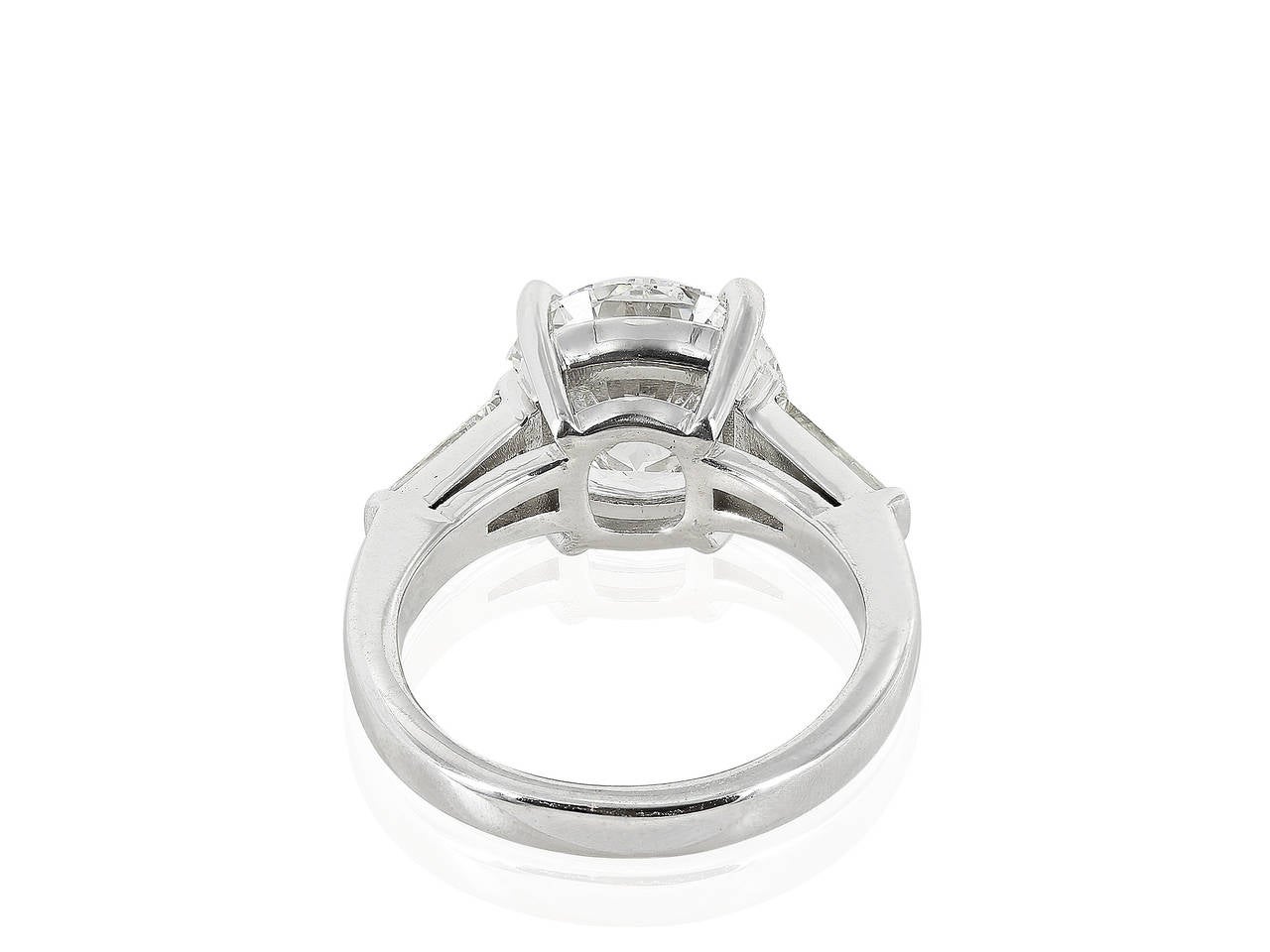 Contemporary 4.04 Carat GIA Cert Round Brilliant Diamond Platinum Three Stone Ring