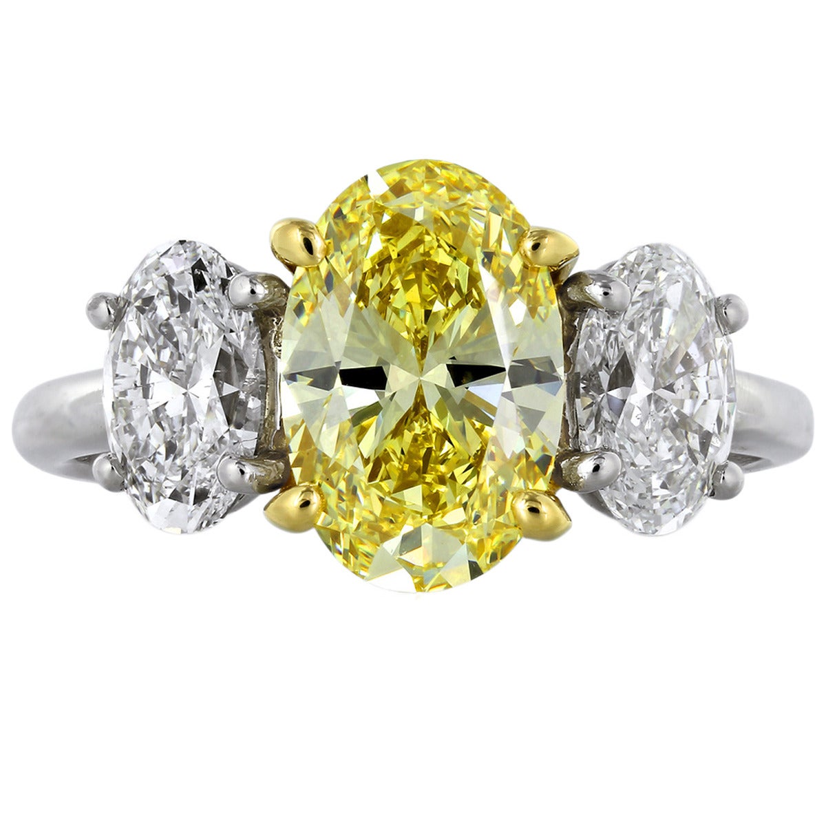 2.12 Carat Fancy Intense Yellow GIA Diamond Ring For Sale