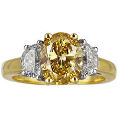 2.04 Carat Oval Shaped Canary Diamond Three Stone Ring