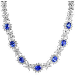 Vintage 27 Carat Oval Shaped Sapphire and Diamond Cluster Necklace