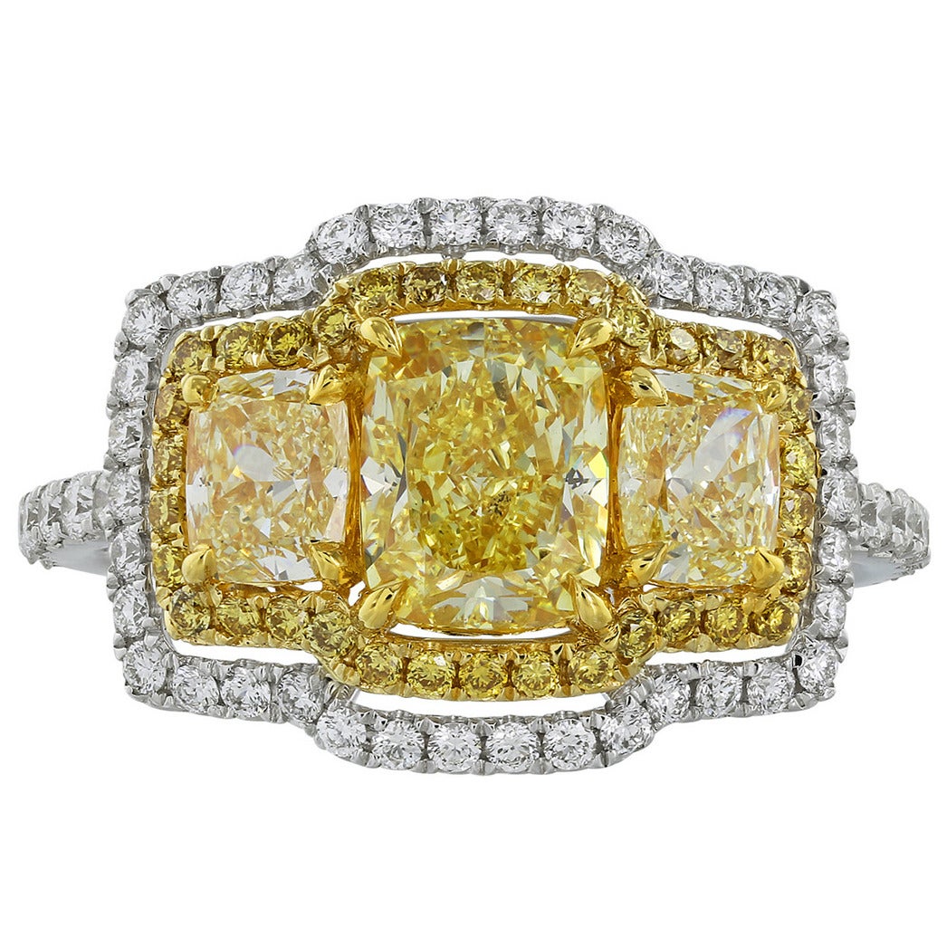 1.24 Carat GIA Cert Fancy Yellow Diamond Gold Three Stone Ring For Sale