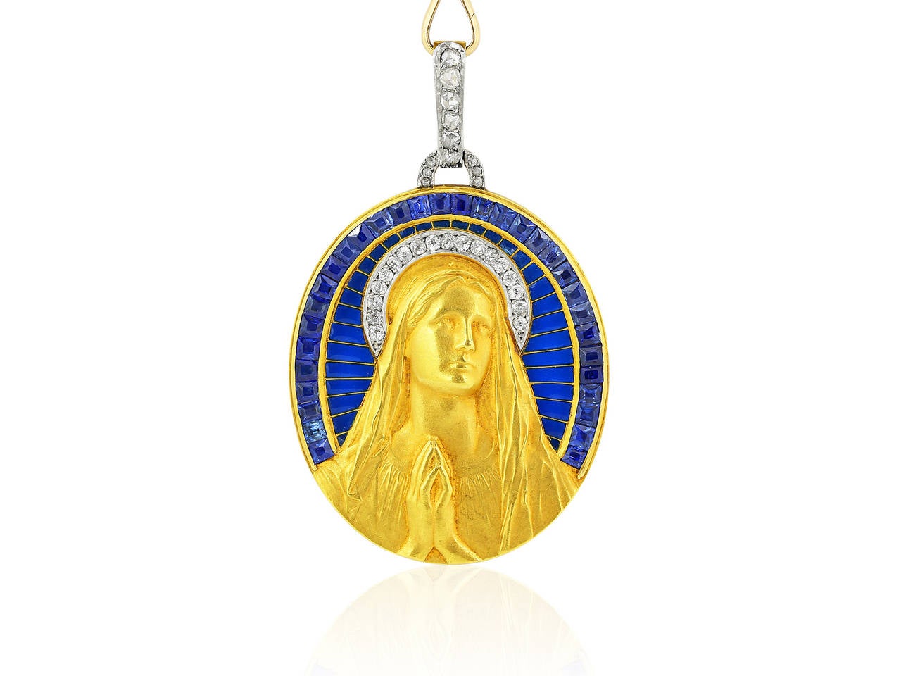 Antique Art Nouveau Plique-a-jour 18 karat yellow gold Madonna pendant featuring a single row of invisible set calibre cut sapphires, blue enamel, rose and Old European cut diamonds.