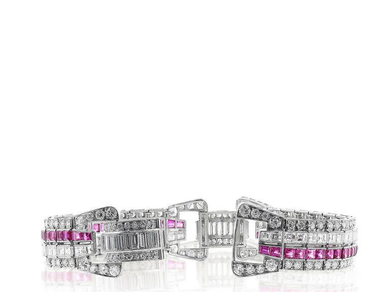 Platinum Art Deco bracelet consisting of 10.00 carats total weight of Old European cut and baguette cut diamonds set with approximately 2.50 carats total weight of custom cut rubies.